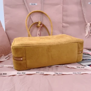 Miu Miu Matelassé tote bag medium tan suede with top handles and zipper detailing