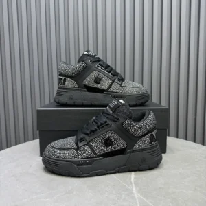 Amiri Skel Top low sneakers black white leather studded detailing