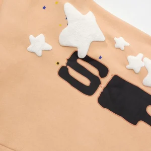 Supreme hoodie beige cotton with white star patches and black graphic print logo detail
