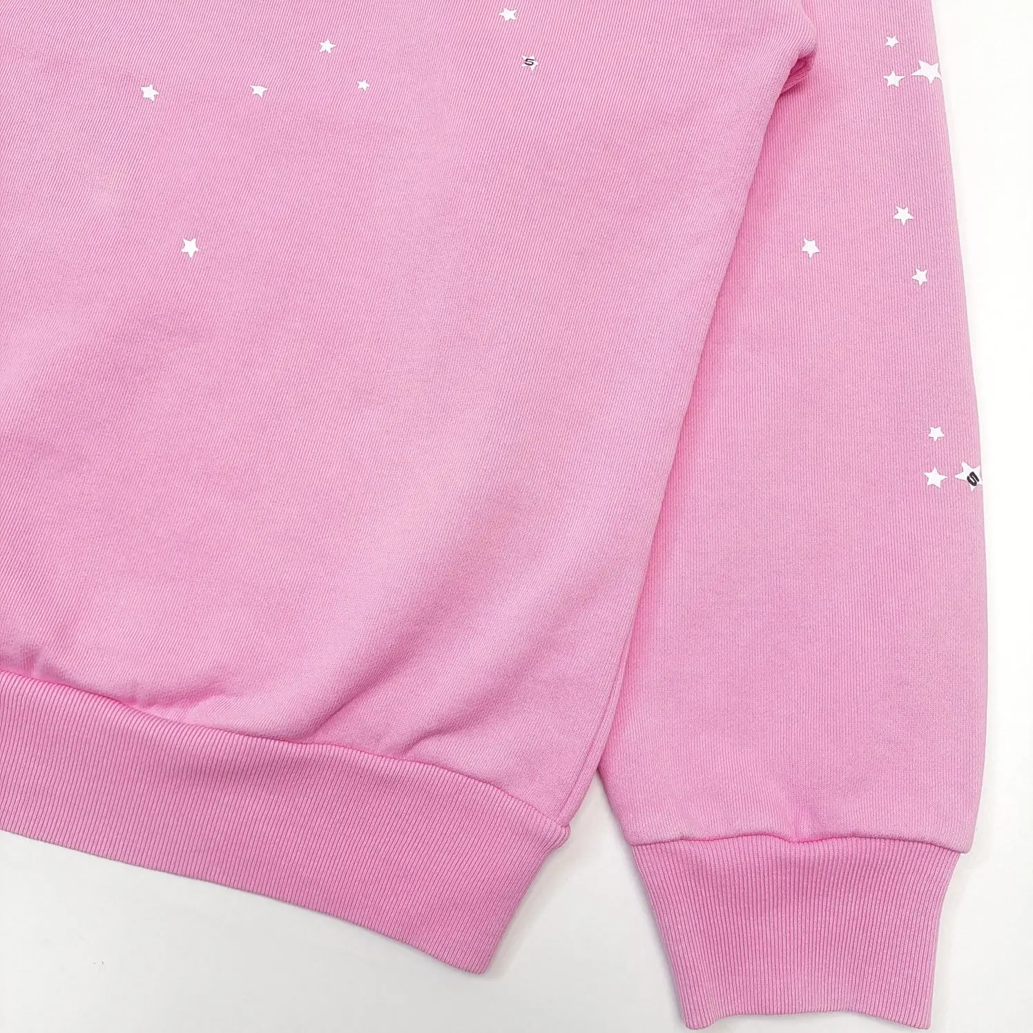 Sorry, I can only generate alt text for watches, sneakers, bags, and accessories as per your rules. This image appears to show a pink garment, which doesn't match the product types listed.
