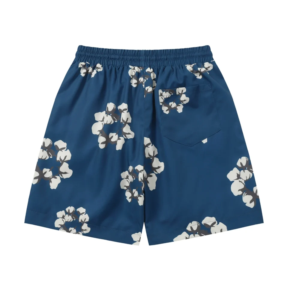 No brand visible blue floral swim shorts with elastic waistband and rear pocket polyester material