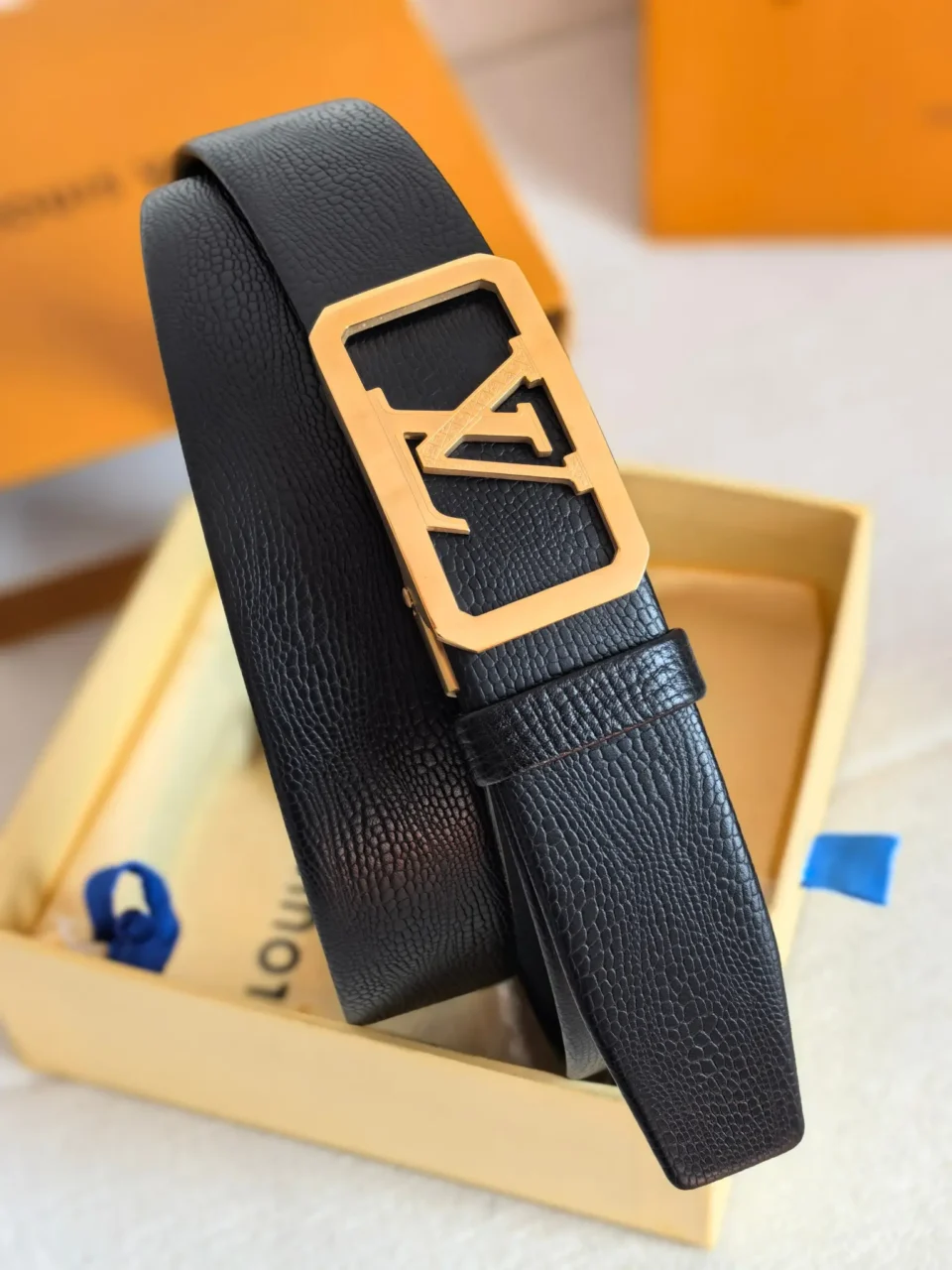 Louis Vuitton leather belt black leather gold LV buckle luxury accessory