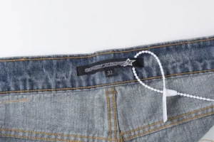 Spiders jeans size 32 blue denim material close-up with waistband and label tag