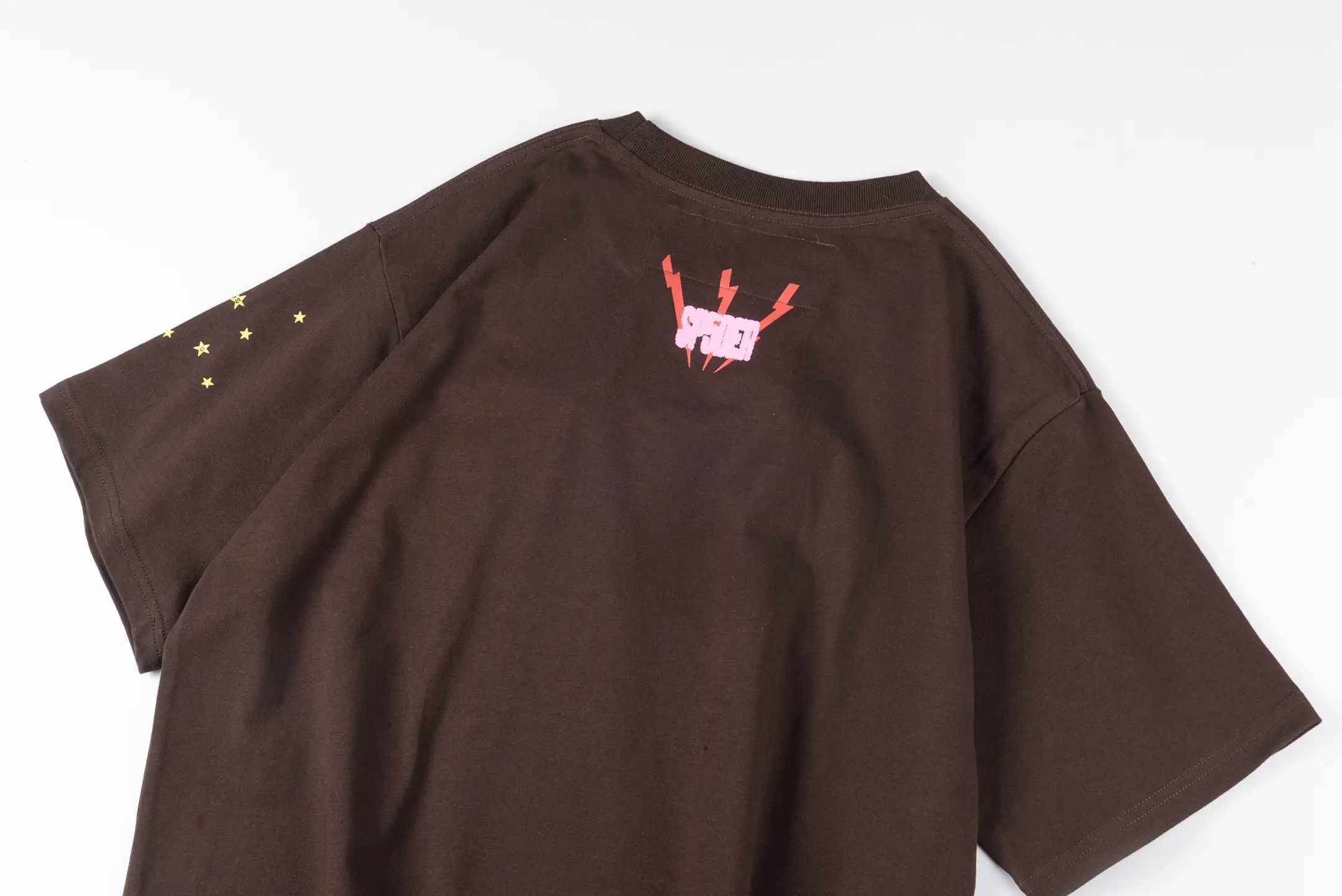 Repsgoat Brown T-shirt size unknown brown cotton with red and pink graphic and gold stars on sleeve