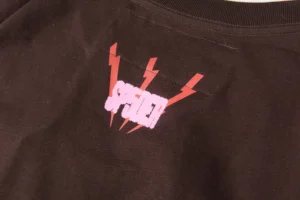 Supreme Lightning Bolt graphic brown cotton t-shirt with pink and red print design