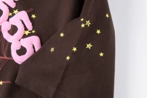 Supreme T-shirt brown cotton fabric with pink logo and yellow star graphic on sleeve