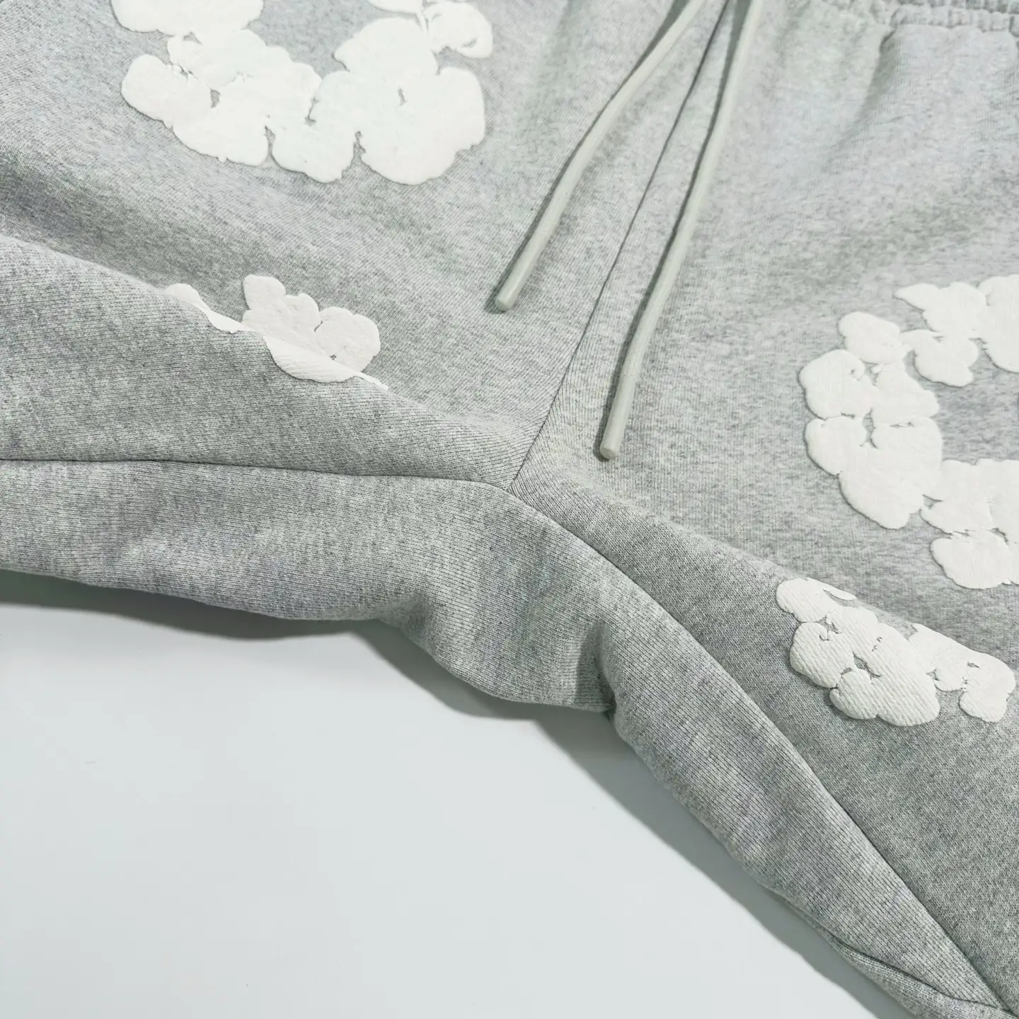 Repsgoat hoodie gray cotton fabric with white textured floral embroidery and adjustable drawstring hood