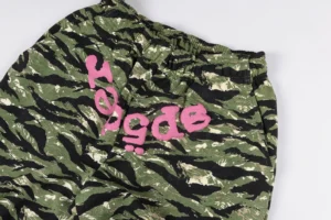 A Bathing Ape camo pants green black beige cotton with pink Ape logo print