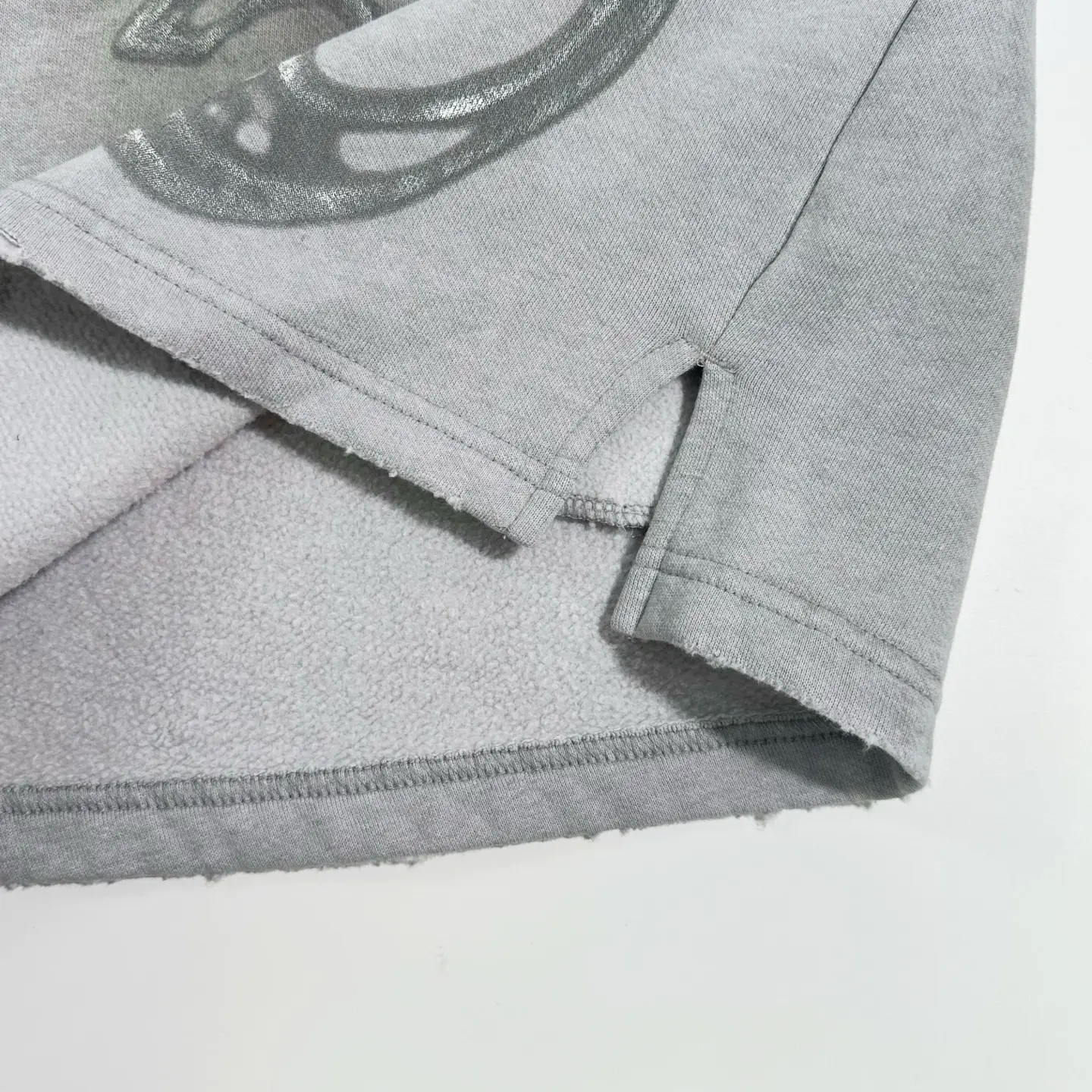 Unknown brand gray sweatshirt fleece interior cotton fabric with detailed hem stitching and side slit