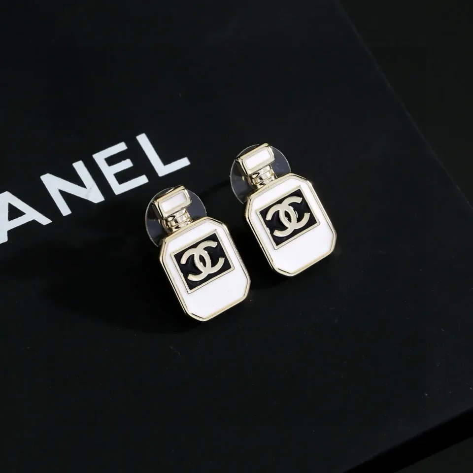 Chanel perfume bottle earrings white enamel gold-tone metal logo stud accessories
