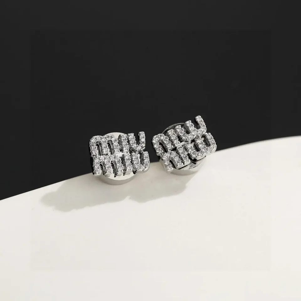 Miu Miu earrings silver-tone metal with crystal-embellished logo stud design accessory