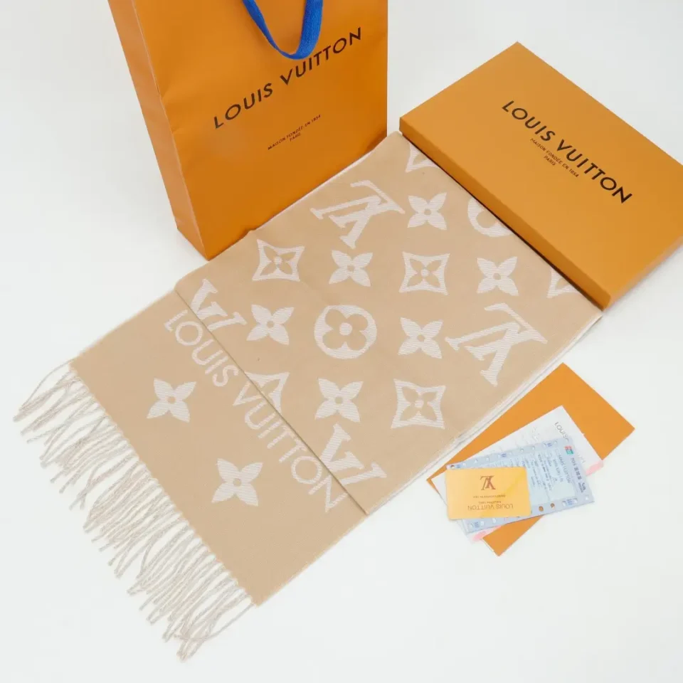 Louis Vuitton Monogram Shawl beige wool scarf with fringe and signature LV pattern