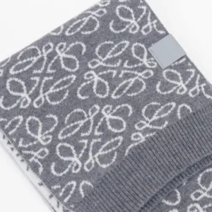 Loewe Anagram scarf grey wool knit with white logo pattern and leather tag detail