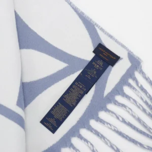 Louis Vuitton scarf light blue white wool with fringe detailing and brand label tag