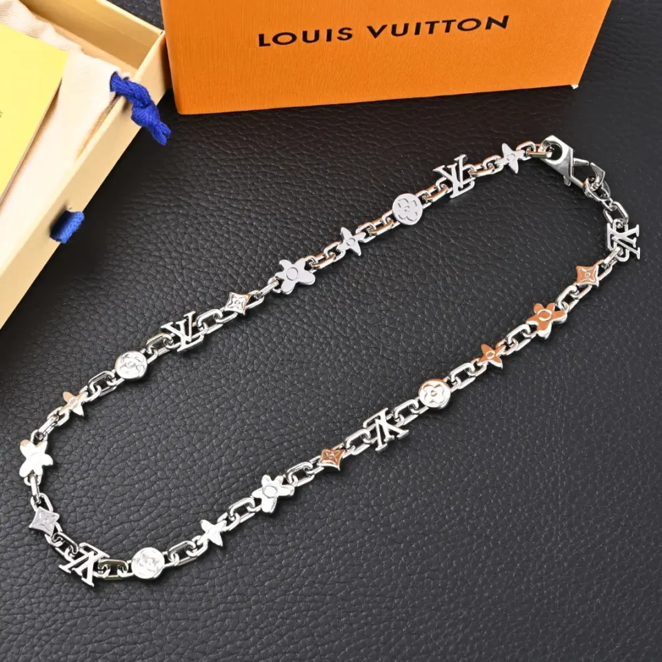 Louis Vuitton necklace silver metal chain with signature LV and floral motifs luxury accessory