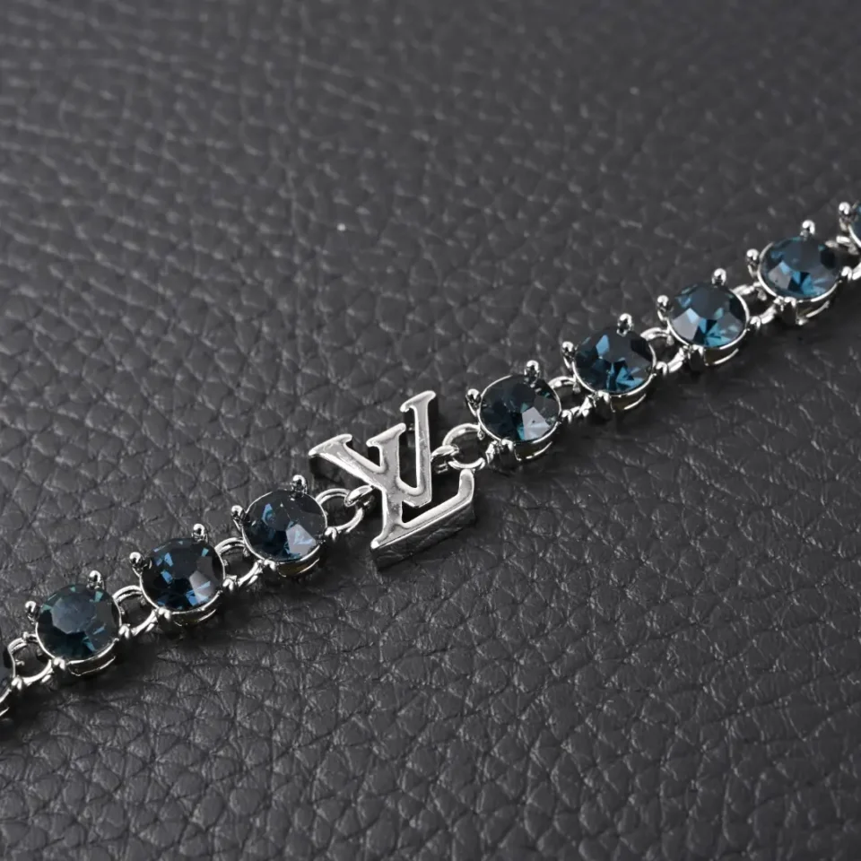Louis Vuitton bracelet silver metal blue crystal stones with LV logo accessory