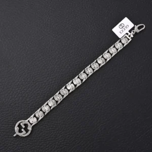 Gucci bracelet silver-tone metal engraved chain link with logo charm and clasp closure accessory