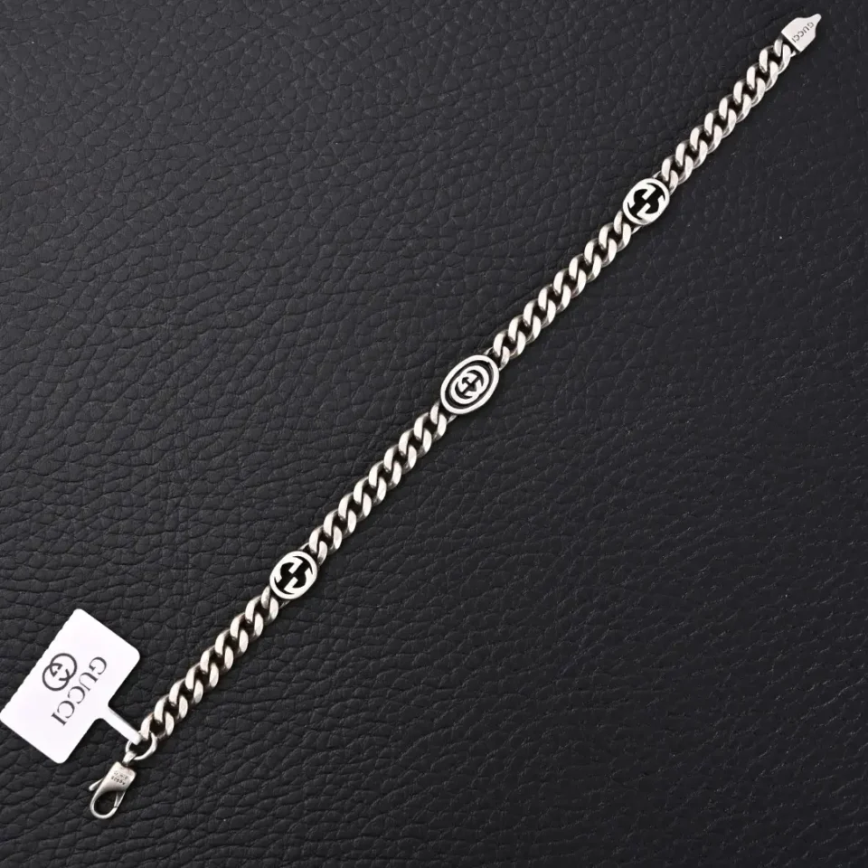 Gucci chain bracelet silver tone metal with double G logo accents and lobster clasp closure