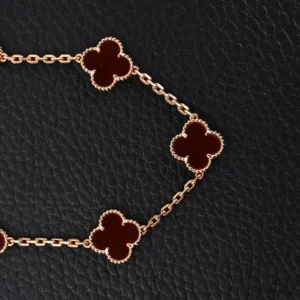 Van Cleef & Arpels Alhambra bracelet rose gold with red carnelian clover motifs jewelry accessory