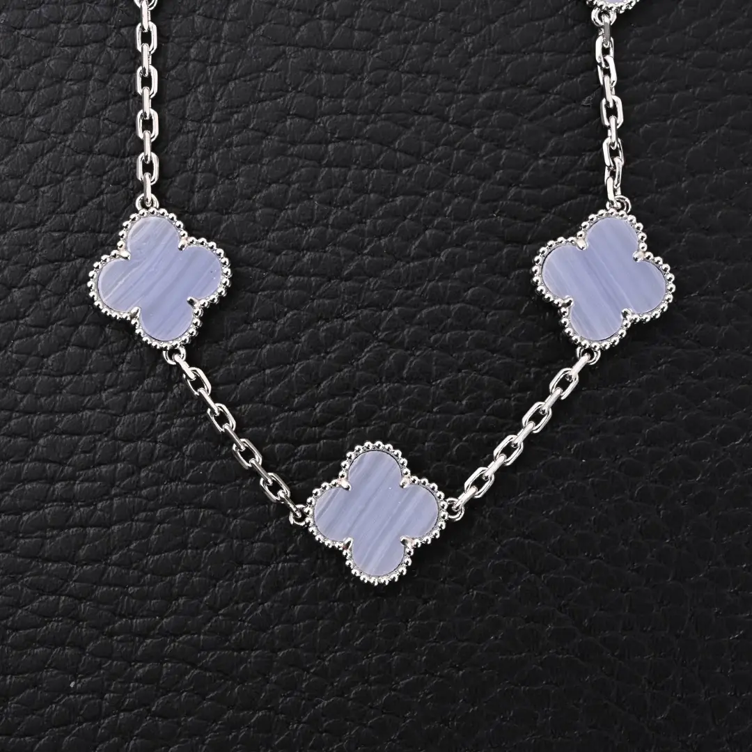 Van Cleef & Arpels Alhambra necklace lilac chalcedony clover motifs white gold chain accessory