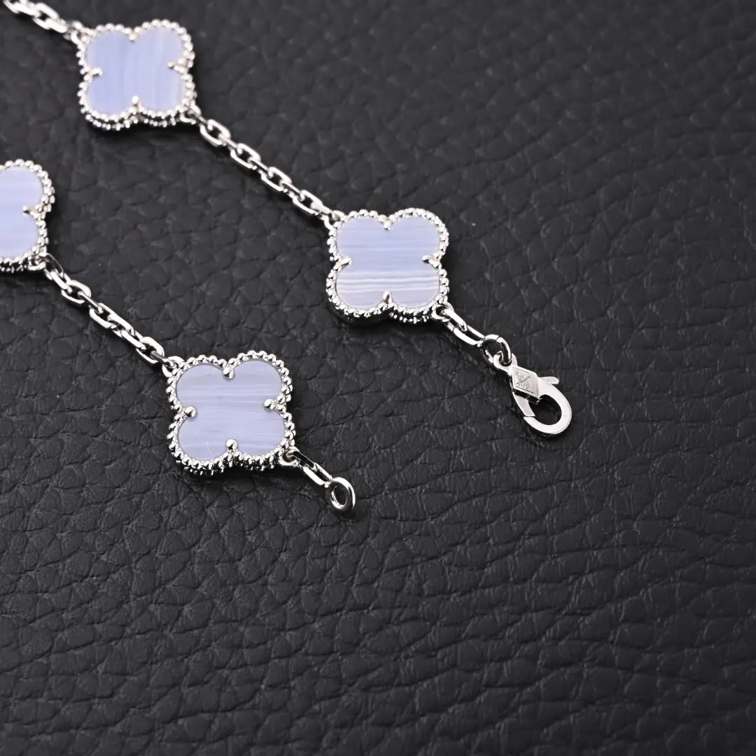 Van Cleef & Arpels Alhambra bracelet light blue chalcedony silver chain jewelry accessory