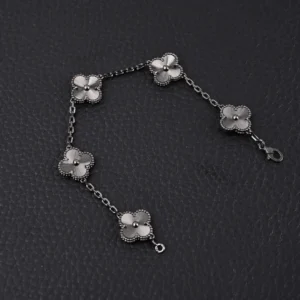 Van Cleef & Arpels Alhambra bracelet silver flower motifs white gold chain accessory