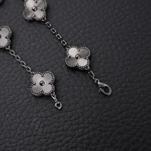 Van Cleef & Arpels Alhambra bracelet white gold floral motif chain accessory