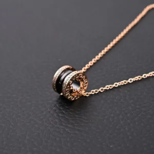 Bvlgari B.Zero1 necklace rose gold black ceramic rings with engraved logo chain accessory