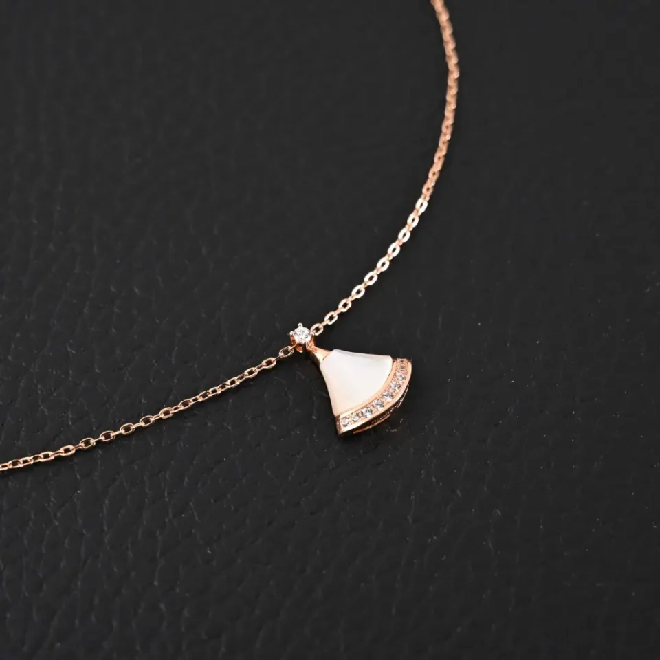 Tiffany & Co. fan-shaped pendant necklace rose gold mother-of-pearl diamond accents delicate chain