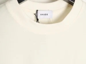 Rhude T-shirt off-white cotton crew neck casual wear with brand logo tag on collar
