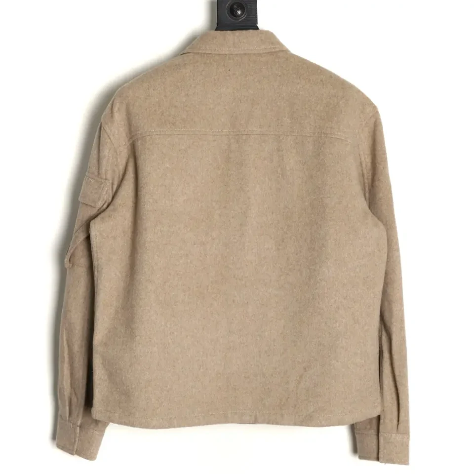 No brand visible beige wool blend jacket with long sleeves and buttoned cuffs shown from the back