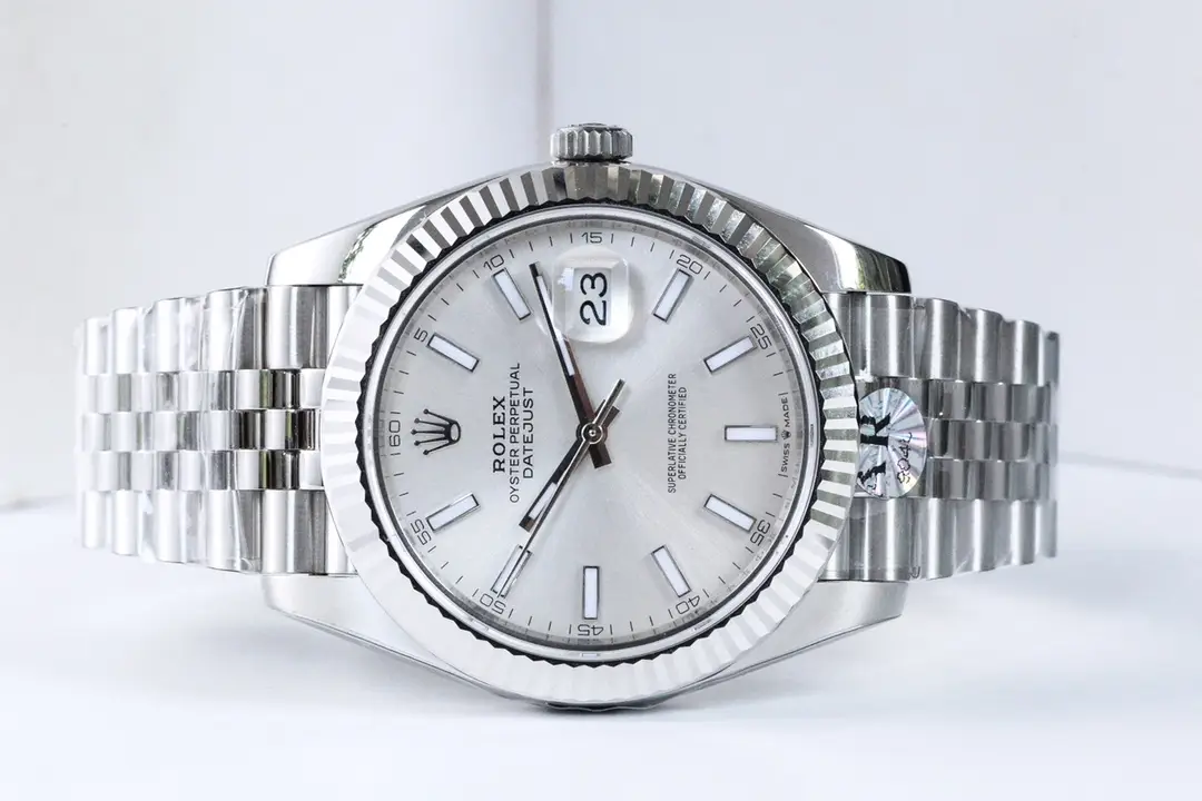 Silver Rolex watch with date display
