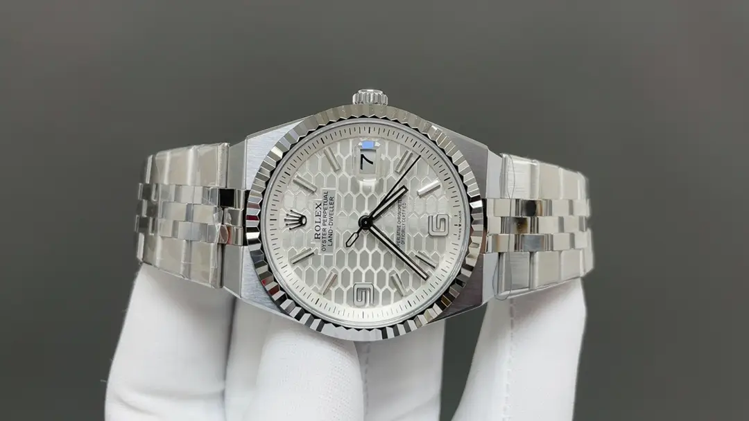 Silver Rolex watch with textured dial