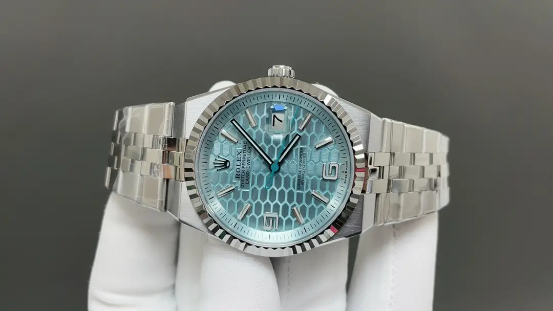 Silver watch with blue honeycomb dial